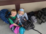 Ryan and Lillian packing gear