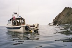 with bodega jim and his 1985 classic 22 angler, backside of santa cruz island  in march of 2003