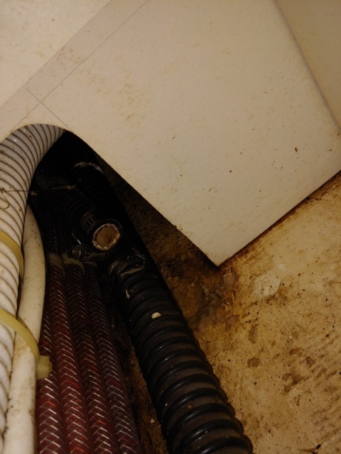 Section of sump pipe with broken nipple from shower sump