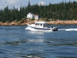 Island Trade passing over the bar at Bass Harbor light.