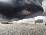 broken fin and sanded drain plug screwhead