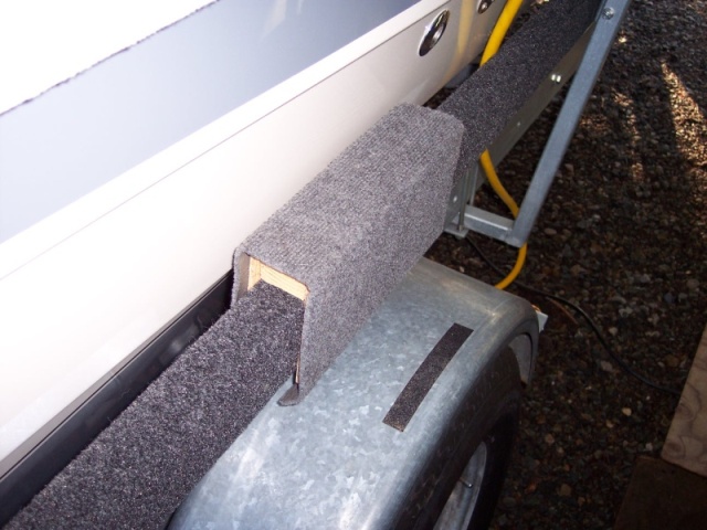 Loading spacer guide over side board, I remove for travel.