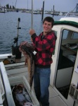 Mason with a 27lb Ling caught outside of Sekiu, 7/26/10