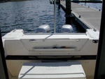 Nice addition, for storage, fish, bait, etc., not to mention a place to put your beer!  Made of Starboard.