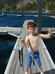 Mason (7 yearsJ) showing off fish from Lake Chelan, 2003.