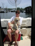 Our new yellow lab Scout, on his first boat ride with my wife Tina.  Leaving the Everett marina 6/17/05