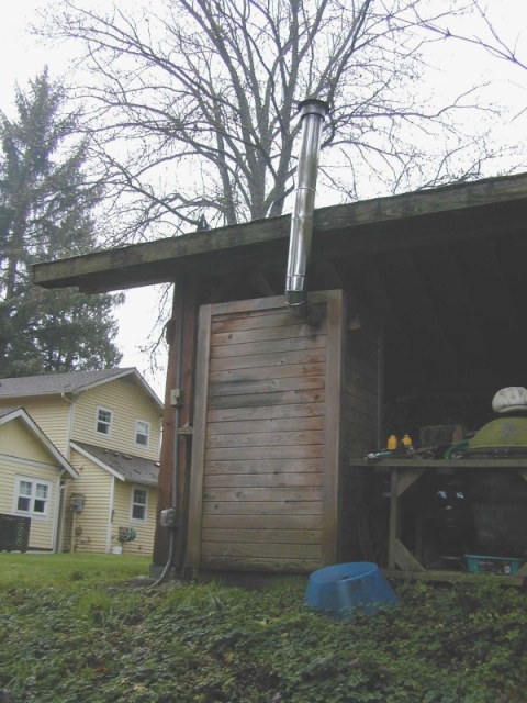 (Mason C. Bailey) Looking up at the back from the fire pit