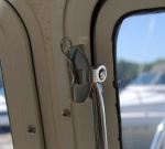 Storage position for clevis pin That locks window open