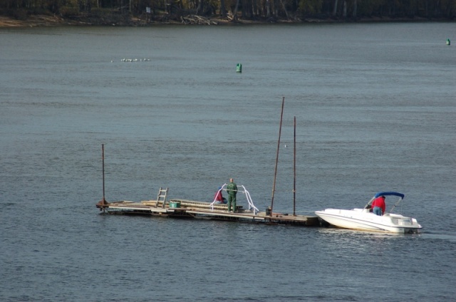 Docks that would be swept away by river ice must be stored for the winter.