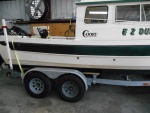 Added a second axle and SS disc brakes to trailer.  Boat came with one 3500 lb axle.  That seemed to light for the job.  Trips to Key West and Lake Powell were uneventful.