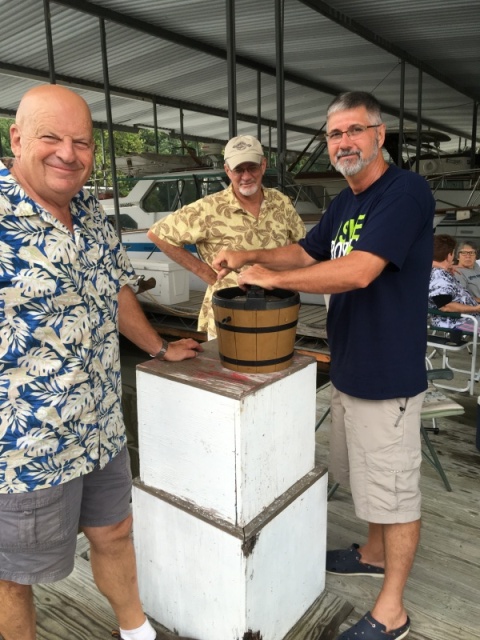 Tex from Bixby's Cub had no problem getting volunteers for cranking the ice cream freezer.