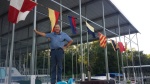 Mike displaying his father's flags.