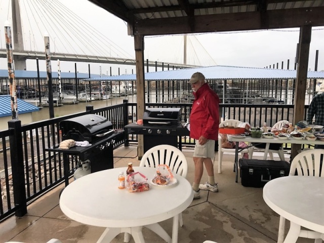 Potluck at Alton Marina. Lee in charge of grill 2!