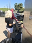 Red and white hots on the grill. Terry and Debby