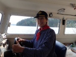 The Admiral at the helm in her German merchant marine uniform.