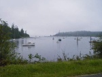 Early morning fog rising, now I see the boats in Mystery Bay.  Looking North toward the entry channel.