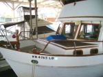 Foredeck with teak deck and anchor windlass.