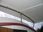 Forward roof arch with center vertical support.  SS straps are Harken brand strap eyes.  Tubing is 7/8 SS.