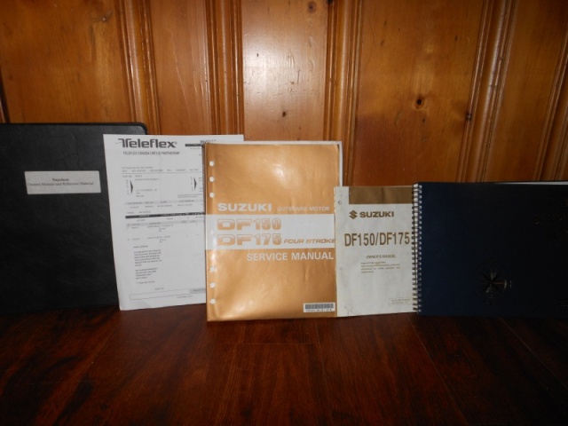 Dec 2013:  Detailed systems binder, upgraded Teleflex steering system receipt, Suzuki 150 'shop manual' ($60 value), engine quick reference guide, and log book with adventures and all service receipts.