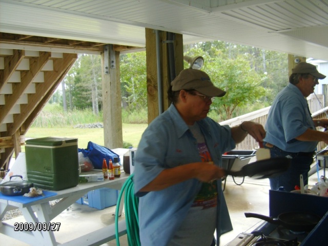 Paula and Bob cooking breakfast.