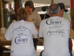 Anne & Doug with the new shirts and old shirts.