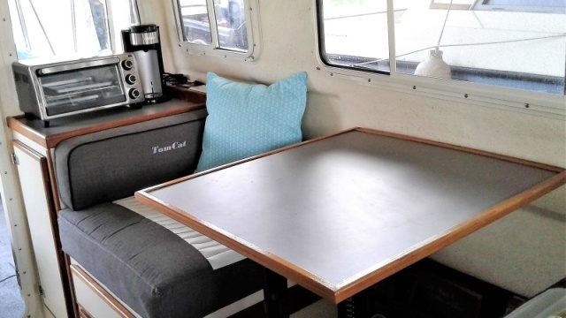 Upgrading table, galley and toaster/Coffee maker counter to color coordinated Formica dresses up the interior and makes cleaning easier