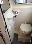 Adding a small sink in Head improves cruising comfort and convenience for crew and really does not cramp Tomcat head
