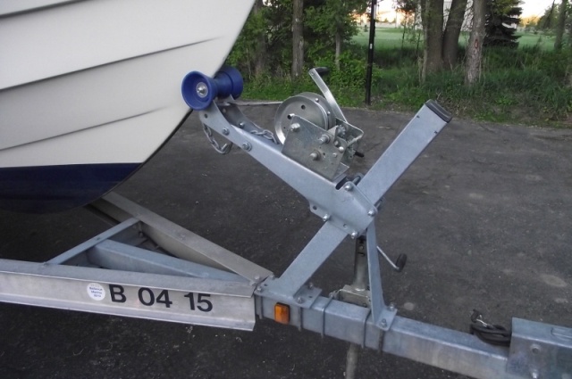Notice bow stop configuration where it sits on main frame. Need to shim and make adjustments to move bow stop rearward.