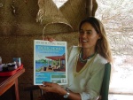 Richenda Eddy, operator of the Tusitiri tours with her husband, holds up August 2004 Architectural Digest where they were profiled