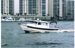 The SusieQ westbound-Fort Myers Yacht Basin in background