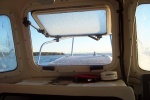 Frosty morning outing. Its hard to scrape the center window from inside the cabin.
