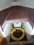 Upholstered V-Berth,
Porta Potty and
Shore Power Cord