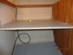 Shelf installed aft stern port side.