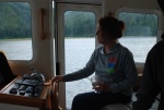 Margaret at the helm of the NT37. Wine helps