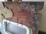 Door is toast. I will be building a new fiberglass one. (Pictured is the bottom of the door).