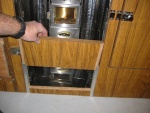 The door and lower kick panel come off for unobstructed air flow. The heater has a 12 volt fan. (Rock-C) 