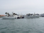 (Sneaks) They heard we were gathering in San Diego bay and prepared. Two Homeland Security fast boats. One marked, the other 