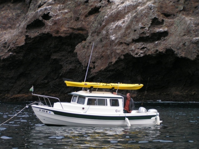 Jeff and boat anchored close to the Painted Cave