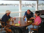 Chris (Rana Verde), Joel and Susan (SEA3PO) enjoying the meal and view from the Anacapa Yacht Club.