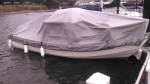 Angola Canvas Cover in 30 mph wind requiring hull line to tie it down.