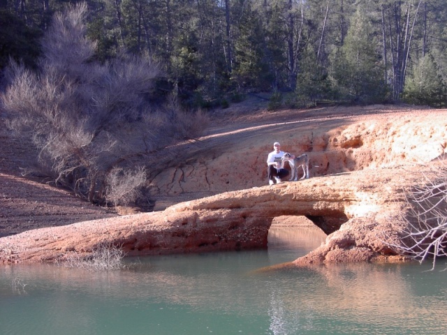 Son Mark and 6 month old Misty on natural bridge at Shasta Lake.