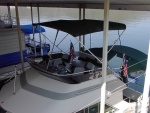 View down into bridge from atop houseboat next door.