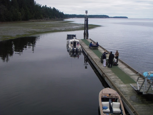 Even at low tide there is room to maneuver, just stay within 30-40ft of the dock to avoid the stakes. (Markers for a shellfish bed).