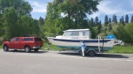 Dana in Wyoming with Andiamo on the way home from her purchase in South Dakota June 2018. Prior to 15 she had been a New England boat. We traded the 03 135 Honda for new Suzukis at Sportcraft in Oregon.