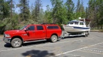 The big red rig,
1 ton diesel, perfect for the R25 Tug but overkill for a CD 25 but decent towing mileage (between 12 and 16 depending on the terrain) and will crest any pass at the speed limit (900 ft lbs of torque)and only need the exaust brake all the way down.(heavier duty trucks may have the same engine power as lighter dutys but have WAY more powerful brakes, and on this truck I have seen up to 90hp of exaust brake hold back and will hold us to under 60mph on the steepest downgrades with the CD25) also only the 1 ton comes with the Aisin trans that won't overheat when towing.