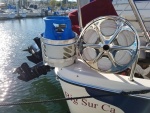 The BBQ propane set up along with the Quickline stern anchor reel which is very compact. 5,000# nylon strap.