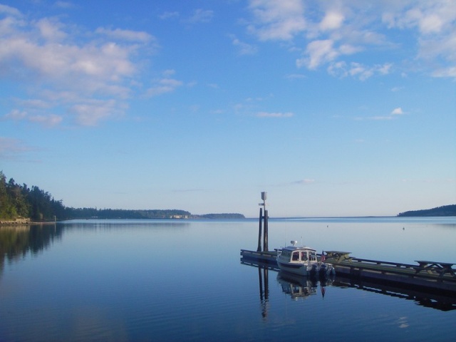 Hard to beat this kind of a morning.  SleepyC at Sequim Bay State Park. Waiting for the 10AM on shore breeze to come up.