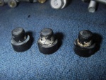 Carb parts, showing mineral deposits.  Probably from untreated (Stabil) fuel that sat in the boat before I bought it.