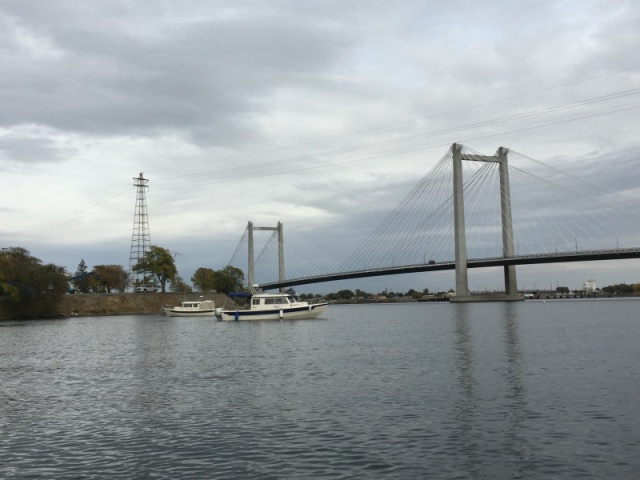 Waiting for the gas dock at Port of Kennewick. Neat highway bridge in background.