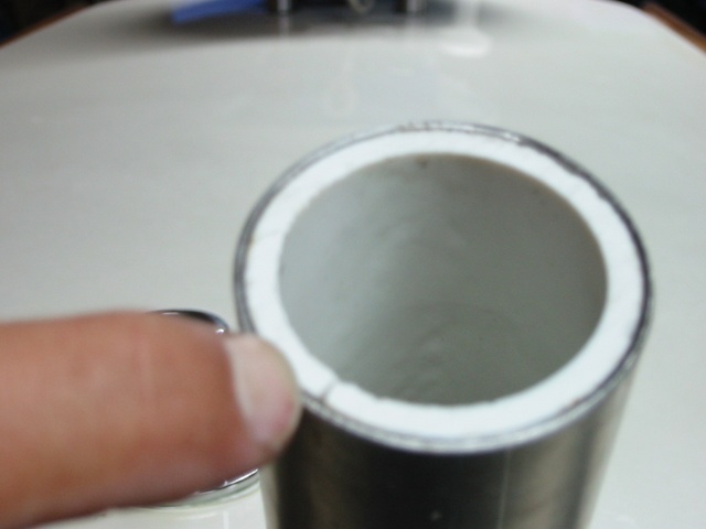 slit in pvc to squeeze liner into stainless tube